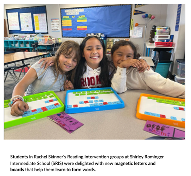 Students with magnetic letters